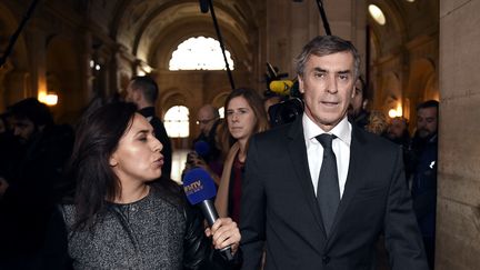 L'ancien ministre du Budget Jérôme Cahuzac arrive au tribunal de grande instance de Paris, le 8 février 2016. (LIONEL BONAVENTURE / AFP)