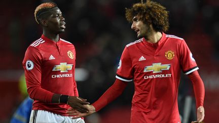 Les milieux de terrain de Manchester United, Paul Pogba et Marouane Fellaini.