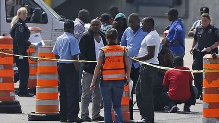 Groupe de demandeurs d'asile arrivant à Lacolle (Québec) le 11 août 2017. ( REUTERS/Christinne Muschi)