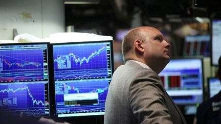 Des traders à New York, le 28 janvier 2011. (Spencer Platt/Getty Images/AFP)