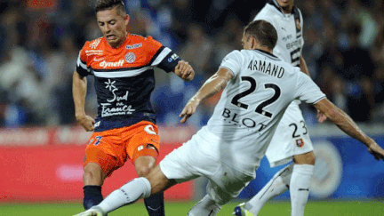 Sylvain Armand (Rennes) tente de s'interposer devant Anthony Mounier (Montpellier)