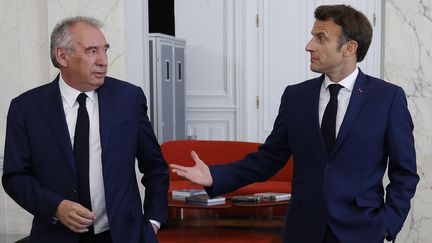 François Bayrou et Emmanuel Macron au palais de l'Elysée à Paris le 21 juin 2022 (LUDOVIC MARIN / POOL / AFP POOL)