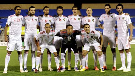 L'&eacute;quipe de football du Maroc, ici le 6 juillet 2012 en Arabie Saoudite avant un match contre la Libye. (AMER HILABI / AFP)