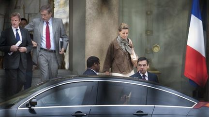 François Fillon et Bernard Kouchner à la sortie de la réunion à l'Elysée - 26/07/10 (AFP Bertrand Langlois)