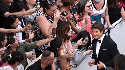 Tom Cruise-Maverick à Cannes, pour présenter&nbsp;"Top&nbsp;Gun&nbsp;:&nbsp;Maverick" (LOIC VENANCE / AFP)