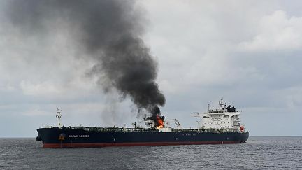 THE "Marlin Luanda" on fire on January 27, 2024 in the Gulf of Aden, after a Houthi-led strike from Yemen.  (INDIAN MINISTRY OF DEFENSE VIA AFP)