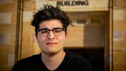 Drew Pavlou sur le campus de l'Université du Queensland à Brisbane,&nbsp;le 1er septembre 2020. (PATRICK HAMILTON / AFP )