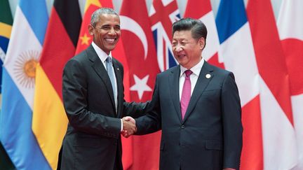 Obama et Xi Jingpin à Shangaï, lors du G20 (septembre 2016), annoncent la ratification de l'accord de la COP21. (AFP)