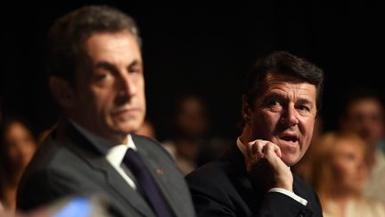 Le président du parti Les Républicains, Nicolas Sarkozy, et Christian Estrosi, le maire de Nice, le 2 juillet 2015 à Chateaurenard (Bouches-du-Rhône). (ANNE-CHRISTINE POUJOULAT / AFP)