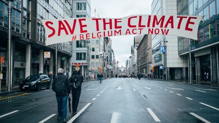 Une marche pour le climat a réuni 70 000 personnes à Bruxelles (Belgique), le 27 janvier 2019. (BERTRAND VANDELOISE / HANS LUCAS / AFP)