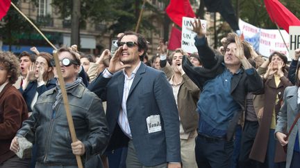 Le Redoutable : photo du film avec Louis Garrel et Stacy Martin
 (Philippe Aubry – Les Compagnons du cinéma)