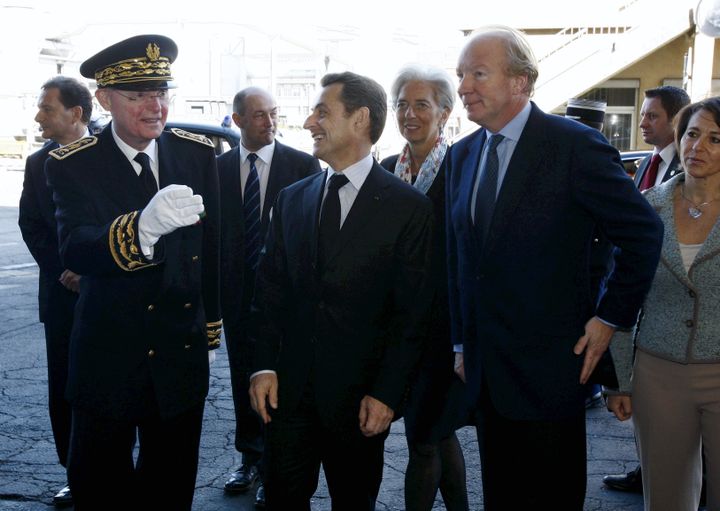 Patrick Stefanini, Nicolas Sarkozy et Brice Hortefeux, le 7 avril 2011 à Issoire (Puy-de-Dôme). (LUDOVIC/REA)