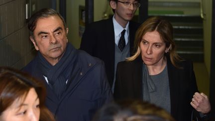 Carlos Ghosn et sa femme Carole Ghosn, à Tokyo (Japon), le 3 avril 2019. (KAZUHIRO NOGI / AFP)