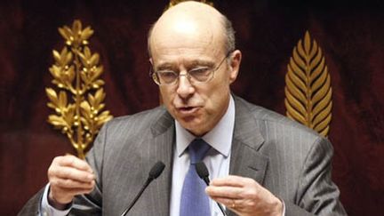 Alain Juppé devant l'Assemblée Nationale, le 22 mars 2011. (AFP - Bertrand Guay)