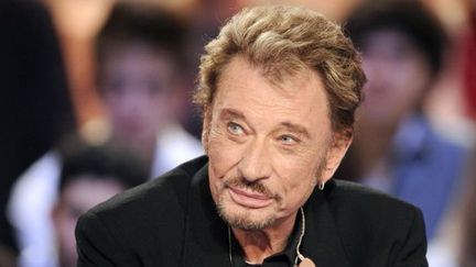 Johnny Hallyday sur le plateau du Grand Journal de Canal+ (28/03/2011)
 (Bertrand Guay / AFP)