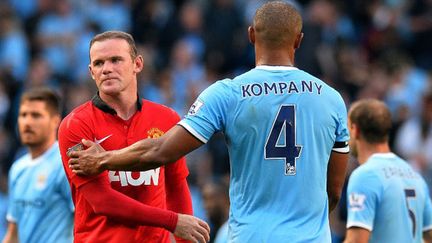 Le joueur de United Wayne Rooney et celui de City Vincent Kompany