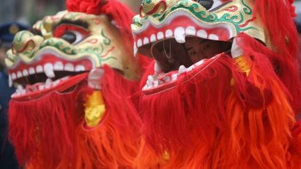 Des masques spectaculaires à un défilé du nouvel an chinois. (AFP - Frédéric J.Brown)