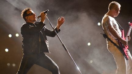 Bono et Adam Clayton du groupe U2 à Mexico City, en mai 2011
 (A.ESTRELLA/AFP)