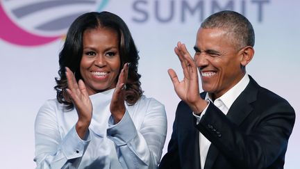 Barack et Michelle Obama vont produire des contenus pour le géant américain Netflix. Aucune date n'est encore annoncée.
 (JIM YOUNG / AFP)