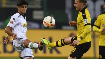 Marcos Reus s'est illustré contre Mahmoud Dahoud (PATRIK STOLLARZ / AFP)