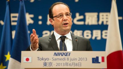 Le pr&eacute;sident fran&ccedil;ais Fran&ccedil;ois Hollande lors d'une conf&eacute;rence de presse &agrave; Tokyo (Japon) le 8 juin 2013.&nbsp; (BERTRAND LANGLOIS / AFP)