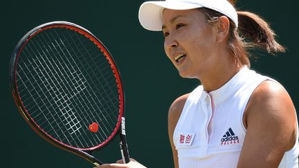 Peng Shuai lors de la deuxième journée des Championnats de Wimbledon 2018 au All England Lawn Tennis Club à Wimbledon à Londres (Angleterre), le 3 juillet 2018. (OLI SCARFF / AFP)