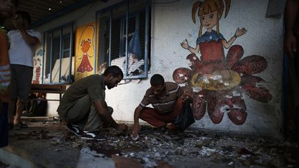 &nbsp; (Une école de l'ONU bombardée cette nuit à Gaza © REUTERS | Mohammed Salem)