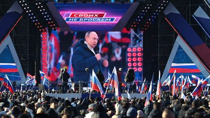 Vladimir Poutine au&nbsp;stade Loujniki de Moscou, le 18 mars 2022, pour la cérémonie du 8e anniversaire du rattachement de la Crimée à la Russie. (VLADIMIR ASTAPKOVICH / SPUTNIK / POOL / MAXPPP)