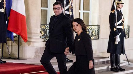 C&eacute;cile Duflot,&nbsp;la ministre du Logement, et son compagnon, Xavier Cantat, le 11 d&eacute;cembre 2012 &agrave; l'Elys&eacute;e, &agrave; Paris. (MAXPPP)