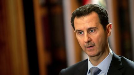 Le pr&eacute;sident syrien Bachar Al-Assad, lors d'une interview &agrave; Damas (Syrie), le 20 janvier 2014. (JOSEPH EID / AFP)