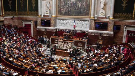 Edouard&nbsp;Philippe s'exprime devant l'Assemblée nationale, à Paris, le 12 juin 2019. (ALAIN JOCARD / AFP)