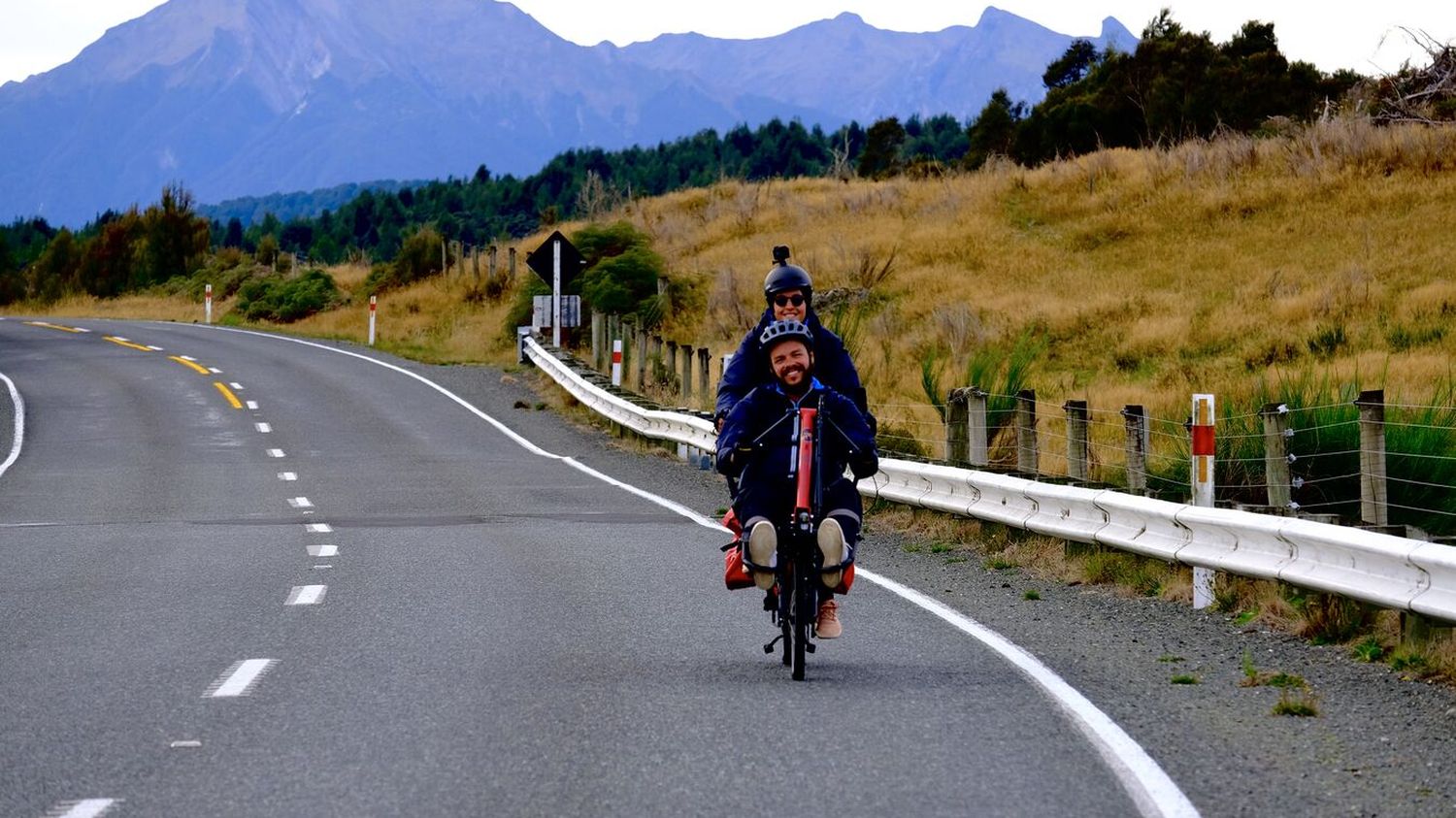 Backpacker.  On the roads of New Zealand in an electric tandem