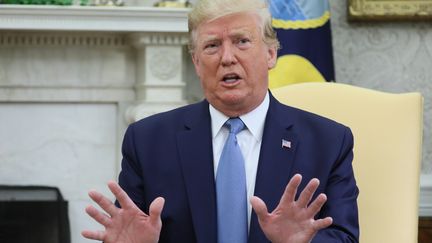 Le président américain, Donald Trump, s'exprime depuis le bureau ovale à la Maison Blanche, le 22 juillet 2019. (JONATHAN ERNST / REUTERS)