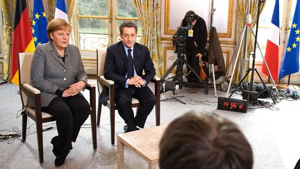 Nicolas Sarkozy et angela Merkel au Palais de l'Elys&eacute;e (France) le 6 f&eacute;vrier 2012. (JESCO DENZEL / BUNDESREGIERUNG / AFP)