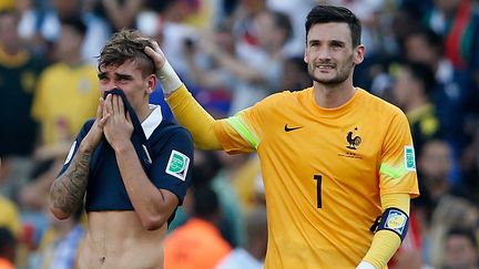 Au Brésil, Antoine Griezmann découvre l’ambiance d’une Coupe du monde. Mais la joie de la première fois se transforme en rêve brisé, le 4 juillet 2014. L’équipe de France est éliminée par l’Allemagne en quarts de finale. (ADRIAN DENNIS / AFP)