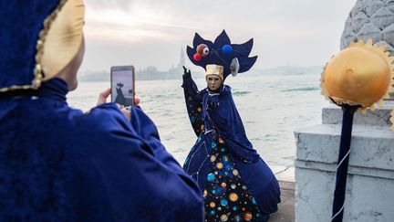 Des touristes au carnaval de Venise, en 2019. (CHRISTOPHE MORIN / MAXPPP)