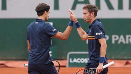 Pierre-Hugues Herbert et Nicolas Mahut participent au tournoi en double de Roland-Garros, le 6 juin 2018 à Paris. (MAXPPP)