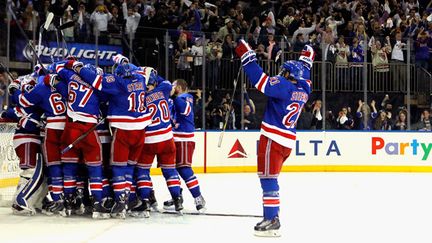 La joie des New York Rangers  (MIKE STOBE / GETTY IMAGES NORTH AMERICA)