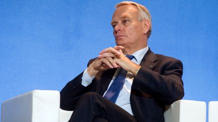 Le Premier ministre, Jean-Marc Ayrault, lors de la visite d'un salon agricole, &agrave; Rennes (Ille-et-Vilaine), le 12 septembre 2013. (ALAIN JOCARD / AFP)