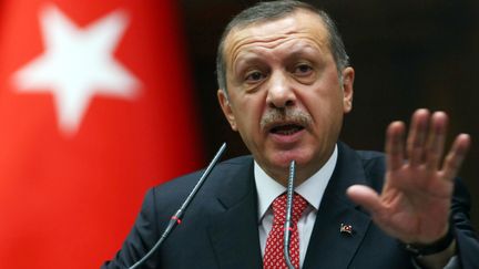 Le Premier ministre&nbsp;Recep Tayyip Erdogan, devant le Parlement turc &agrave; Ankara, mardi 26 juin. (ADEM ALTAN / AFP)