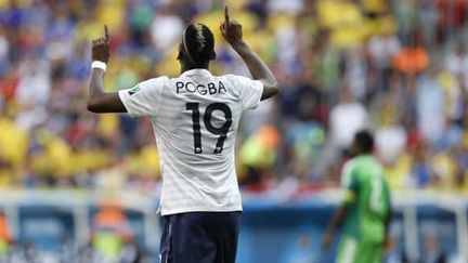 Le milieu de terrain français Paul Pogba après son but contre le Nigéria