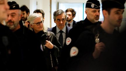 François et Penelope Fillon, le 11 mars 2020 à Paris. (THOMAS SAMSON / AFP)