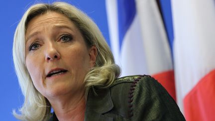 Marine Le Pen, pr&eacute;sidente du Front national, lors d'une conf&eacute;rence de presse &agrave; Nanterre (Hauts-de-Seine), le 25 juin 2013. (PHILIPPE WOJAZER / REUTERS)