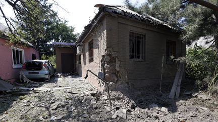 Des habitations bombard&eacute;es &agrave; Donetsk (Ukraine), le 14 ao&ucirc;t 2014. (SERGEI KARPUKHIN / REUTERS)