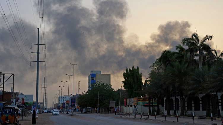 Smoke above residential buildings east of Khartoum in Sudan on April 16, 2023. (AFP)