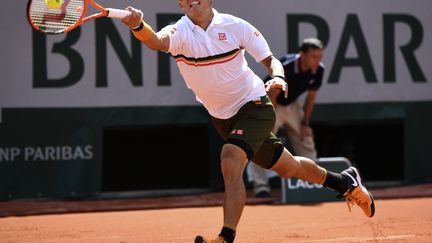 Le Japonais Kei Nishikori n'a rien lâché contre Fernando Ferdasco pour finalement s'imposer. (ERIC FEFERBERG / AFP)