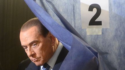 Silvio Berlusconi, le 24 f&eacute;vrier 2013 &agrave; Milan (Italie). (OLIVIER MORIN / AFP)