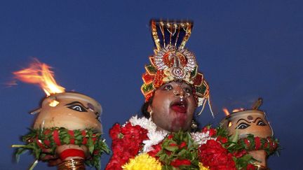 La procession de 15 km de Kuala Lumpur aux grottes de Batu prend environ 8 heures sous une chaleur accablante. (LAI SENG SIN / AP / SIPA)