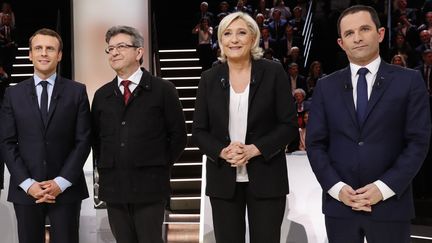 Les candidats à l'élection présidentielle de 2017 Emmanuel Macron, Jean-Luc Mélenchon, Marine Le Pen et Benoît Hamon, lors d'un débat télévisé, le 20 mars 2017.&nbsp; (PATRICK KOVARIK / AFP)