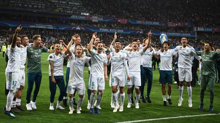 La joie des joueurs madrilènes, vainqueurs de la Ligue des champions contre Liverpool (3-1), samedi 26 mai 2018 à Kiev (Ukraine). (FRANCK FIFE / AFP)